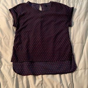 Navy polkadot blouse. Short sleeve.